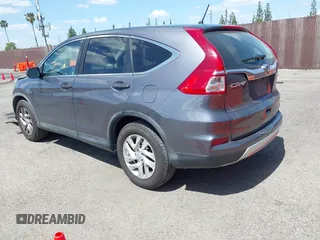 2015 Honda CR-V EX with VIN 3CZRM3H58FG711070, listed as a IAAI auction lot 41948788 with 140,130 mi miles and . Bid and sale history available at carsss.com. Image 3.