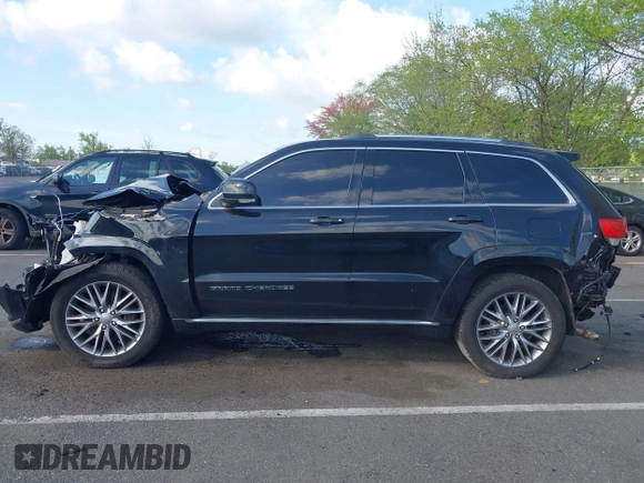 2018 Jeep Grand Cherokee Summit with VIN 1C4RJFJT5JC120523, listed as a IAAI auction lot 42136651 with 75,699 mi miles and . Bid and sale history available at DreamBid. Image 14.
