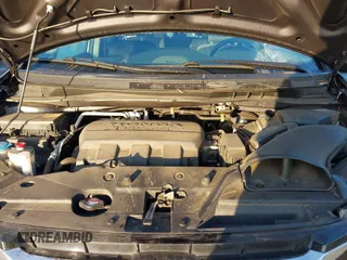 2015 Honda Odyssey LX с VIN 5FNRL5H27FB068761, выставлен на аукционе IAAI как лот 41479420 с пробегом 84 532 миль миль и . История ставок и продаж доступна на DreamBid. Изображение 10.