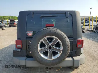 2009 Jeep Wrangler X with VIN 1J4FA24159L772540, listed as a Copart auction lot 62183815 with 179,628 mi miles and Salvage title. Bid and sale history available at DreamBid. Image 6.