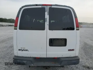 1998 GMC Savana z VIN 1GJHG39R0W1004126, wystawiony jako Copart lot #53609964 z przebiegiem 105 675 mil mil oraz Nie do naprawy • Non repairable. Historia ofert i sprzedaży dostępna na DreamBid. Obrazek 6.