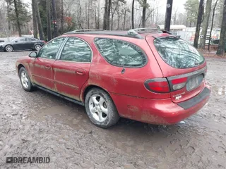 2001 Ford Taurus SE Standard with VIN 1FAFP58U91A290623, listed as a IAAI auction lot 41503243 with 117,194 mi miles. Bid and sale history available at carsss.com. Image 3.