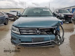 2021 Volkswagen Tiguan SE z VIN 3VV3B7AX9MM066823, wystawiony jako Copart lot #55422685 z przebiegiem 103 524 mil mil oraz Szkoda całkowita • Salvage title. Historia ofert i sprzedaży dostępna na DreamBid. Obrazek 5.