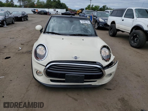 2019 MINI Convertible Cooper с VIN WMWWG5C57K3D01554, выставлен на аукционе Copart как лот 57497795 с пробегом 98 158 миль миль и Списание • Salvage title. История ставок и продаж доступна на DreamBid. Изображение 5.