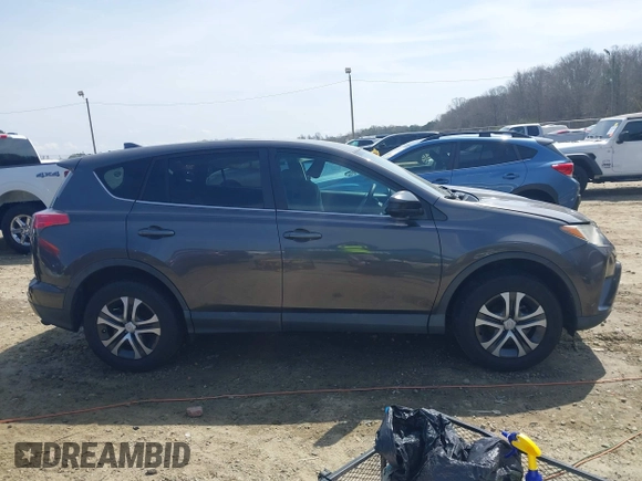 2017 Toyota RAV4 LE with VIN 2T3ZFREV9HW390859, listed as a IAAI auction lot 41802727 with 167,085 mi miles and . Bid and sale history available at carsss.com. Image 13.