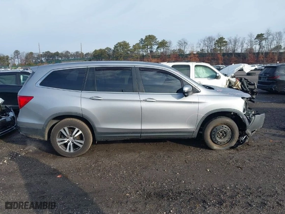 2018 Honda Pilot EX-L with VIN 5FNYF6H59JB026068, listed as a IAAI auction lot 41458049 with 128,769 mi miles. Bid and sale history available at carsss.com. Image 13.