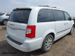 2014 Chrysler Town & Country Touring with VIN 2C4RC1BG4ER404320, listed as a IAAI auction lot 42075325 with 233,018 mi miles. Bid and sale history available at carsss.com. Image 4.