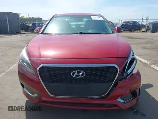 2016 Hyundai Sonata Hybrid SE with VIN KMHE24L18GA026079, listed as a IAAI auction lot 42051741 with 116,076 mi miles. Bid and sale history available at carsss.com. Image 12.