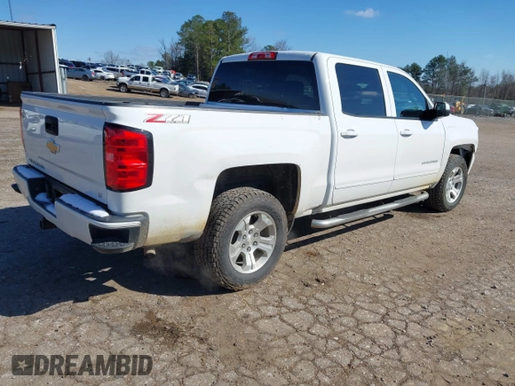 2018 Chevrolet Silverado 1500 LT with VIN 3GCUKREC3JG504431, listed as a IAAI auction lot 41609921 with 192,742 mi miles. Bid and sale history available at carsss.com. Image 4.