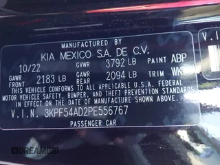 2023 Kia Forte GT-Line z VIN 3KPF54AD2PE556767, wystawiony jako IAAI lot #41245293 z przebiegiem 25 106 mil mil oraz . Historia ofert i sprzedaży dostępna na DreamBid. Obrazek 9.