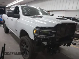 2024 Ram 2500 Laramie with VIN 3C6UR5FJ7RG143466, listed as a IAAI auction lot 41753978 with 9,996 mi miles. Bid and sale history available at carsss.com. Image 1.
