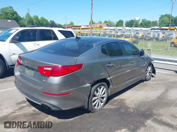 2015 Kia Optima LX z VIN 5XXGM4A7XFG508280, wystawiony jako IAAI lot #42116240 z przebiegiem 221 269 mil mil oraz . Historia ofert i sprzedaży dostępna na DreamBid. Obrazek 4.