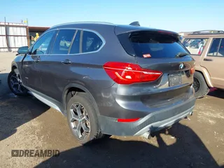 2017 BMW X1 sDrive28i with VIN WBXHU7C30H5H32753, listed as a IAAI auction lot 41441791 with 100,072 mi miles. Bid and sale history available at carsss.com. Image 3.