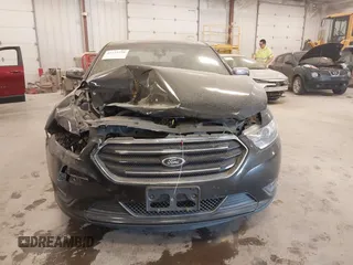 2014 Ford Taurus Limited z VIN 1FAHP2J88EG112614, wystawiony jako IAAI lot #42135220 z przebiegiem 70 409 mil mil oraz . Historia ofert i sprzedaży dostępna na DreamBid. Obrazek 12.