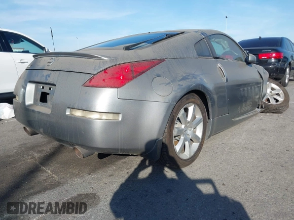 2004 Nissan 350Z Touring with VIN JN1AZ34E84T060682, listed as a IAAI auction lot 41616199 with 209,814 mi miles. Bid and sale history available at carsss.com. Image 4.