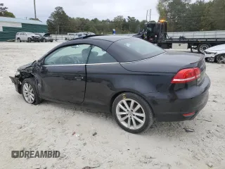 2015 Volkswagen Eos Komfort with VIN WVWBW8AH6FV005693, listed as a Copart auction lot 79176614 with 106,556 mi miles and Salvage Title. Bid and sale history available at DreamBid. Image 2.