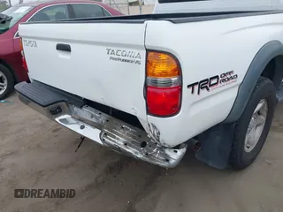 2003 Toyota Tacoma PreRunner z VIN 5TEGN92N83Z221444, wystawiony jako IAAI lot #42433353 z przebiegiem 148 600 mil mil oraz . Historia ofert i sprzedaży dostępna na DreamBid. Obrazek 6.