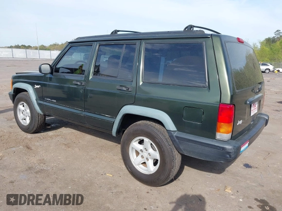 1998 Jeep Cherokee Sport with VIN 1J4FT68S8WL131348, listed as a IAAI auction lot 41912540 with 111,579 mi miles. Bid and sale history available at carsss.com. Image 3.