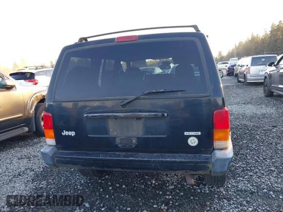 2000 Jeep Cherokee z VIN 1J4FF48S5YL260176, wystawiony jako IAAI lot #41381885 z przebiegiem Nie podano mil oraz . Historia ofert i sprzedaży dostępna na DreamBid. Obrazek 16.