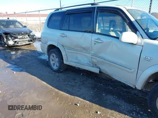 2003 Suzuki XL7 Touring z VIN JS3TX92V734100178, wystawiony jako IAAI lot #41386492 z przebiegiem 91 912 mil mil oraz . Historia ofert i sprzedaży dostępna na DreamBid. Obrazek 6.