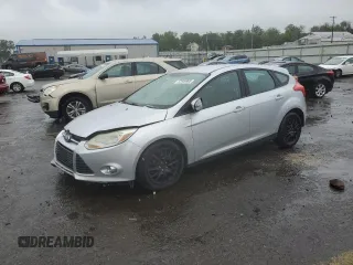 2012 Ford Focus SE z VIN 1FAHP3K24CL132458, wystawiony jako Copart lot #57849965 z przebiegiem 110 120 mil mil oraz Szkoda całkowita • Salvage title. Historia ofert i sprzedaży dostępna na DreamBid. Obrazek 1.