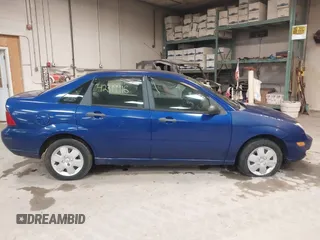 2006 Ford Focus S z VIN 1FAFP34N66W232191, wystawiony jako IAAI lot #42319916 z przebiegiem 51 438 mil mil oraz . Historia ofert i sprzedaży dostępna na DreamBid. Obrazek 14.