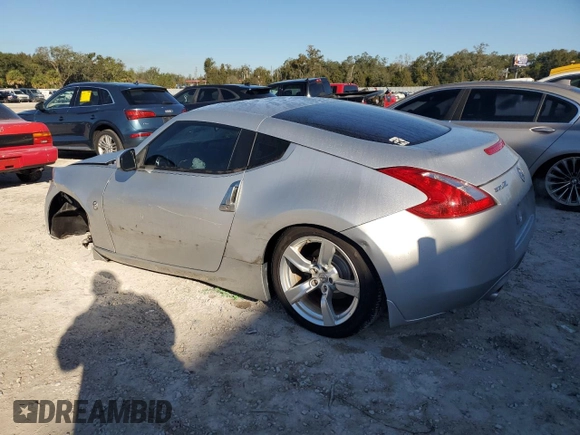 2010 Nissan 370Z Touring with VIN JN1AZ4EH1AM504859, listed as a Copart auction lot 87377564 with 98,765 mi miles and Salvage Title. Bid and sale history available at carsss.com. Image 2.