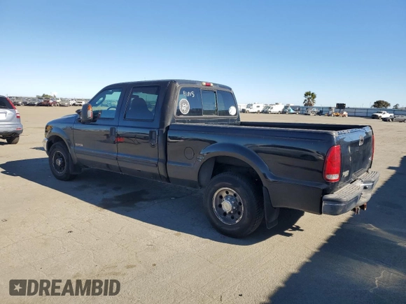 2003 Ford Super Duty F-250 XL with VIN 1FTNW20P23EB90968, listed as a Copart auction lot 41882395 with 215,373 mi miles and Salvage Title. Bid and sale history available at carsss.com. Image 2.