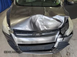 2013 Ford Escape SE with VIN 1FMCU0GX7DUC84970, listed as a Copart auction lot 59611935 with 138,605 mi miles and Salvage title. Bid and sale history available at DreamBid. Image 12.