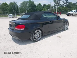 2009 BMW 1 Series 135i with VIN WBAUN93569VK40357, listed as a IAAI auction lot 42412038 with 141,944 mi miles and . Bid and sale history available at DreamBid. Image 4.