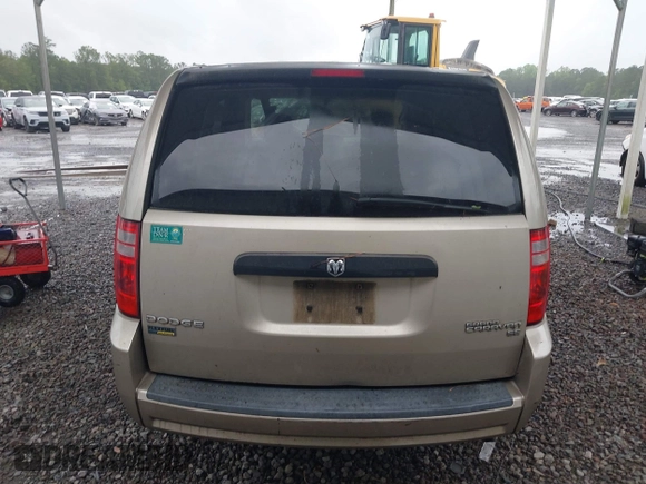 2009 Dodge Grand Caravan SE z VIN 2D8HN44E59R585342, wystawiony jako IAAI lot #42241676 z przebiegiem 329 636 mil mil oraz . Historia ofert i sprzedaży dostępna na DreamBid. Obrazek 16.