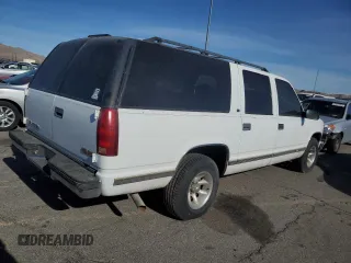 1999 GMC Suburban with VIN 3GKEC16R6XG538009, listed as a Copart auction lot 87112424 with 220,487 mi miles and Clean Title. Bid and sale history available at DreamBid. Image 3.