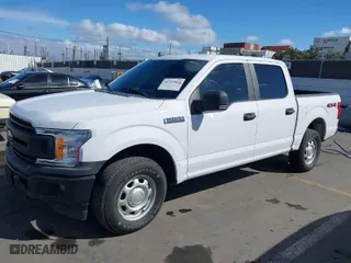 2020 Ford F-150 XL with VIN 1FTEW1E41LKE12636, listed as a IAAI auction lot 41725868 with 137,584 mi miles. Bid and sale history available at carsss.com. Image 2.