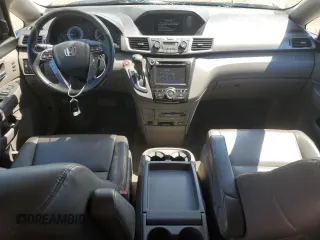 2015 Honda Odyssey Touring Elite with VIN 5FNRL5H92FB504977, listed as a Copart auction lot 56657195 with 189,438 mi miles and Salvage title. Bid and sale history available at DreamBid. Image 8.
