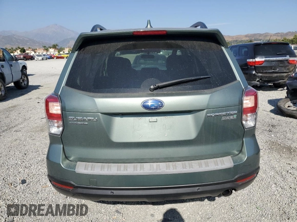 2017 Subaru Forester Touring с VIN JF2SJAWC0HH581060, выставлен на аукционе Copart как лот 61966085 с пробегом 59 745 миль миль и Списание • Salvage title. История ставок и продаж доступна на DreamBid. Изображение 6.