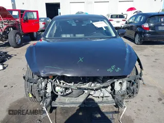 2018 Mazda 3 Touring with VIN 3MZBN1L34JM164952, listed as a IAAI auction lot 42179420 with 106,706 mi miles and . Bid and sale history available at DreamBid. Image 12.