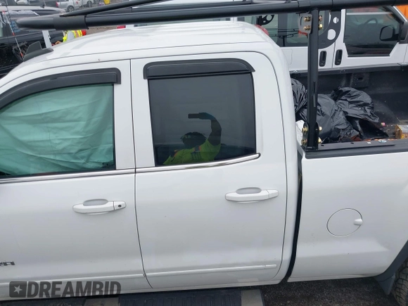 2015 GMC Sierra 1500 SLE z VIN 1GTR1UEH0FZ358519, wystawiony jako IAAI lot #42212768 z przebiegiem 144 324 mil mil oraz . Historia ofert i sprzedaży dostępna na DreamBid. Obrazek 14.