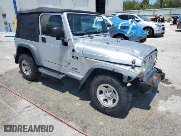 2004 Jeep Wrangler X with VIN 1J4FA39S74P763492, listed as a Copart auction lot 54664095 with 168,493 mi miles and Salvage Title. Bid and sale history available at DreamBid. Image 4.