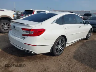 2021 Honda Accord Touring with VIN 1HGCV2F9XMA005191, listed as a IAAI auction lot 42088545 with 169,611 mi miles and . Bid and sale history available at DreamBid. Image 4.