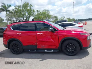 2022 Hyundai Santa Fe XRT z VIN 5NMS64AJ3NH382831, wystawiony jako IAAI lot #42100573 z przebiegiem 46 502 mil mil oraz . Historia ofert i sprzedaży dostępna na DreamBid. Obrazek 6.