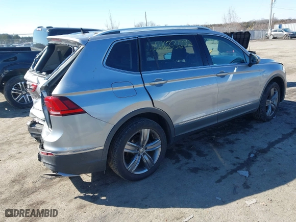 2020 Volkswagen Tiguan SE with VIN 3VV2B7AX0LM141970, listed as a IAAI auction lot 41633622 with 64,737 mi miles. Bid and sale history available at carsss.com. Image 4.