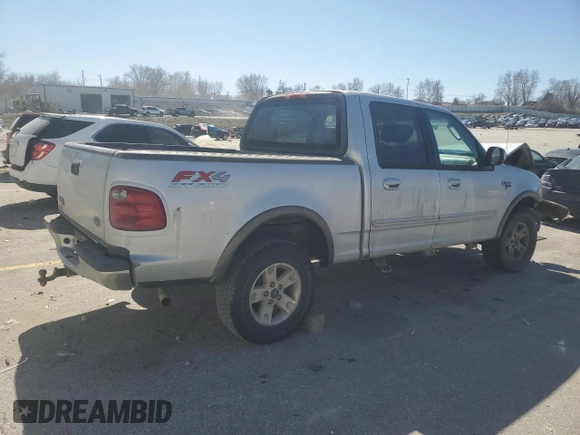 2003 Ford F-150 XLT with VIN 1FTRW08L03KD74119, listed as a Copart auction lot 47373105 with 303,513 mi miles and Salvage Title. Bid and sale history available at carsss.com. Image 3.