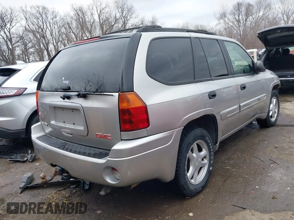 2005 GMC Envoy SLE with VIN 1GKDT13S552332088, listed as a IAAI auction lot 41699178 with 196,869 mi miles. Bid and sale history available at carsss.com. Image 4.