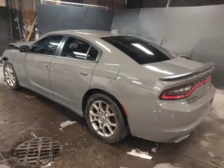 2017 Dodge Charger SXT with VIN 2C3CDXJG0HH644860, listed as a IAAI auction lot 41579357 with 105,994 mi miles and . Bid and sale history available at carsss.com. Image 3.