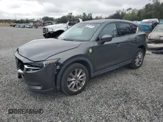 2020 Mazda CX-5 Grand Touring with VIN JM3KFADM6L0839527, listed as a Copart auction lot 46677475 with 50,305 mi miles and Salvage Title. Bid and sale history available at carsss.com. Image 1.