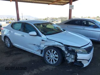 2014 Kia Optima EX z VIN 5XXGN4A74EG294124, wystawiony jako IAAI lot #41413272 z przebiegiem 154 058 mil mil oraz . Historia ofert i sprzedaży dostępna na DreamBid. Obrazek 13.