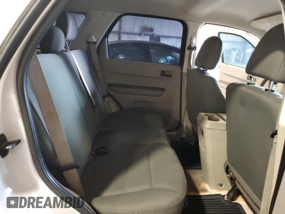 2011 Ford Escape XLS с VIN 1FMCU0C78BKC53371, выставлен на аукционе Copart как лот 54767005 с пробегом 227 192 миль миль и Списание • Salvage title. История ставок и продаж доступна на DreamBid. Изображение 11.
