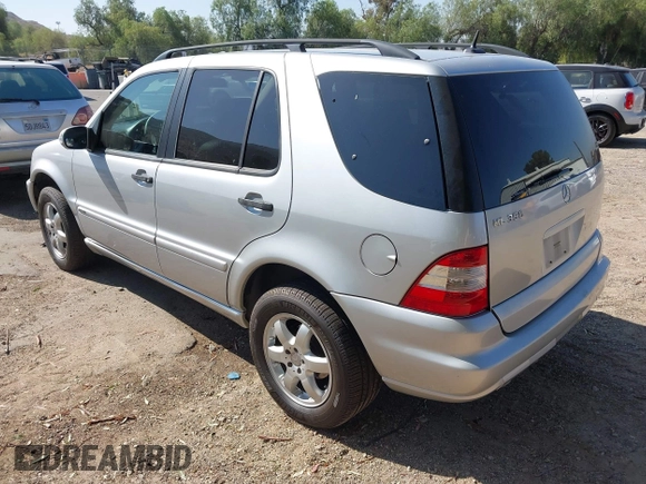 2003 Mercedes-Benz M 350 with VIN 4JGAB57EX3A438290, listed as a IAAI auction lot 42670213 with 246,915 mi miles and . Bid and sale history available at DreamBid. Image 3.