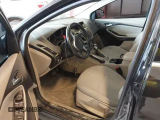 2012 Ford Focus SEL with VIN 1FAHP3M24CL331586, listed as a IAAI auction lot 42086129 with 193,060 mi miles. Bid and sale history available at carsss.com. Image 5.
