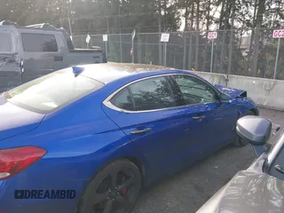 2020 Genesis G70 3.3T with VIN KMTG34LEXLU049127, listed as a IAAI auction lot 41376324 with 38,539 mi miles and . Bid and sale history available at DreamBid. Image 13.